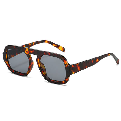 Men's and women's pilot sunglasses with a black plastic frame and vibrant orange-yellow lenses. - Image 2