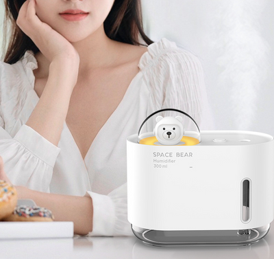 White square humidifier with a clear base, featuring a cute white bear figure in a clear dome, labeled "SPACE BEAR Humidifier 300 ml". - Image 14