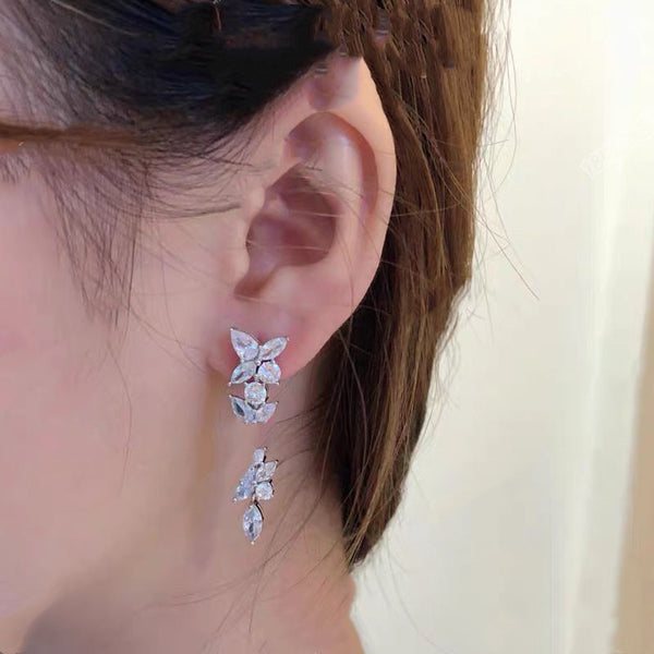 Aretes de Oro Blanco 18k con Moissanita - Fila de Diamantes