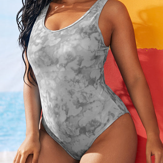 Purple tie-dye one-piece swimsuit with a scoop neck, worn by a person in a poolside setting. - Image 9