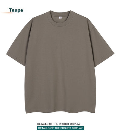 Moss green short-sleeve cotton t-shirt with a crew neck and a relaxed, oversized fit. - Image 31