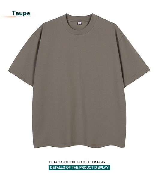 Moss green short-sleeve cotton t-shirt with a crew neck and a relaxed, oversized fit. - Image 31