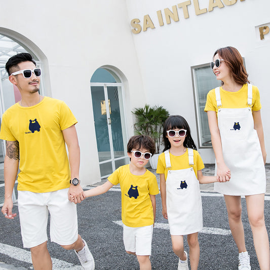 Yellow short-sleeve t-shirt with a black cartoon bear graphic and '100090' text on the front.
