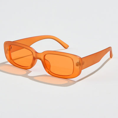Rectangular tortoiseshell sunglasses with a small frame and dark gray lenses, angled on a white background. - Image 47
