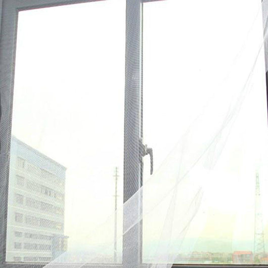 White self-adhesive mosquito screen applied to a gray window frame, offering clear visibility to the outside. - Image 7