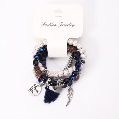 Pulsera Cristal Piedra Volcánica Multicapa con Borla Ala para Mujer - Image 5