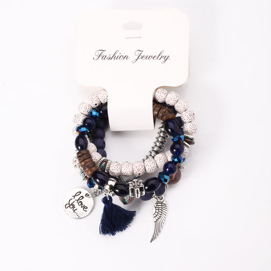 Pulsera Cristal Piedra Volcánica Multicapa con Borla Ala para Mujer - Image 5