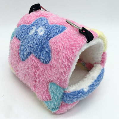 Colorful plush pet sleeping bag with purple, blue, and pink blocks, white fleece lining, and metal hooks for hanging. - Image 4