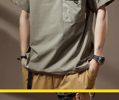 Men's khaki short-sleeve polo shirt with a lapel collar, three buttons, and a large flap chest pocket with a D-ring. - Image 20