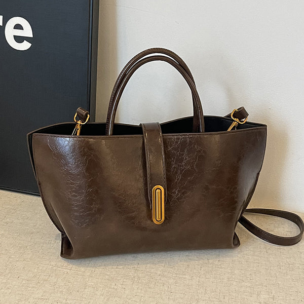 Bolso Bucket de Cuero Encerado Elegante y Portátil
