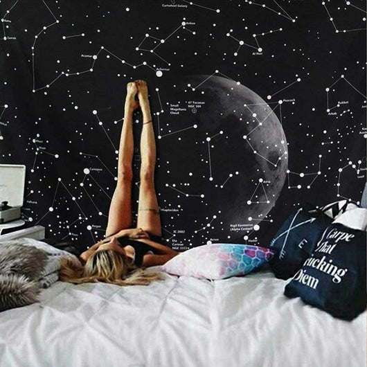 Black tapestry with white constellations and a large grey moon hanging above a bed in a bedroom. - Image 26
