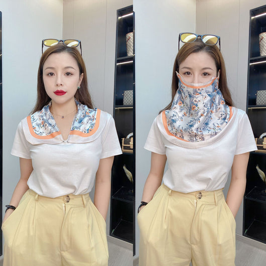 Female cream and black floral polka dot sun protection mask with ear loops, designed for eye corner protection. - Image 46