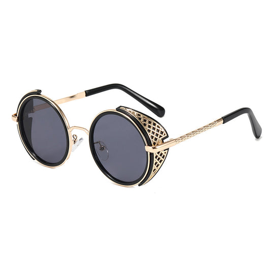 Round gold-framed sunglasses with light blue lenses and decorative side shields, featuring black temple tips.
