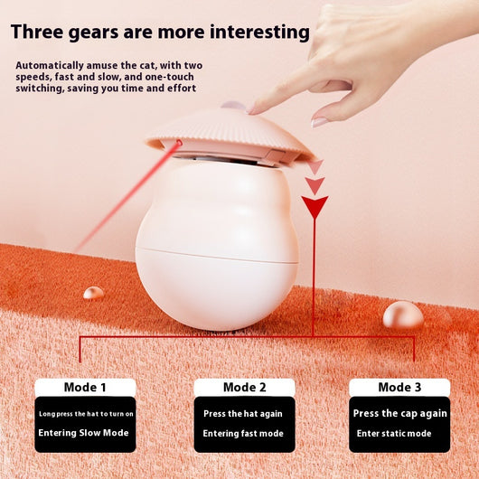 Two pink intelligent electric cat toy tumblers with ribbed tops and red laser emitters, set against a minimalist pink background. - Image 4