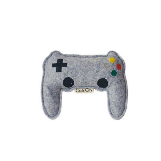 Light blue felt catnip toy shaped like a game controller with piano keys and a black string for hanging. - Image 12