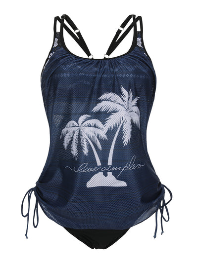 Olive green tankini top with white palm trees and 'live simple' text, paired with black swim bottoms on a beach. - Image 17