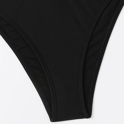Black halter-neck tankini swimsuit with pink and white floral print, paired with solid black high-cut bikini bottoms. - Image 4
