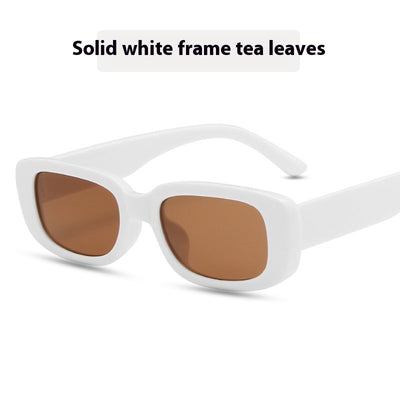 Children's small frame oval sunglasses with a solid white PC frame and brown AC lenses for UV protection. - Image 14