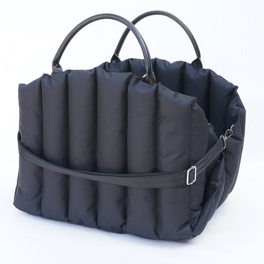 Light khaki quilted portable pet carrier with brown handles and a cream shoulder strap for car travel. - Image 8