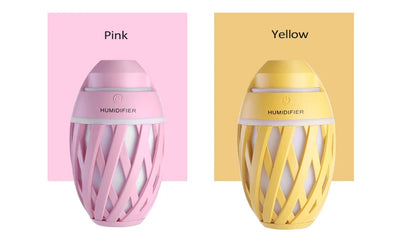 Light green football-shaped humidifier with a decorative lattice pattern and a power button on top. - Image 20