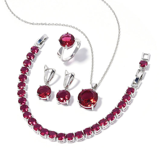 Four-piece jewelry set with silver-toned metal and round deep pink gemstones, including a necklace, bracelet, ring, and earrings. - Image 23