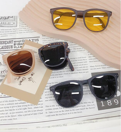 Light brown foldable women's sunglasses with round frames and brown polarized lenses on a white background. - Image 3