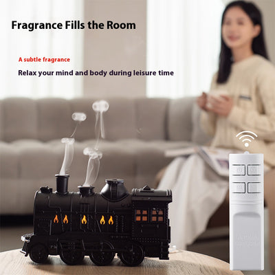 Black train-shaped essential oil diffuser and humidifier with retro design, emitting mist and glowing lights. - Image 4