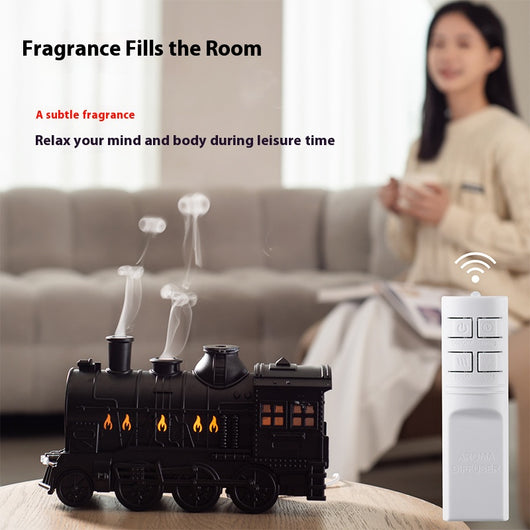 Black train-shaped essential oil diffuser and humidifier with retro design, emitting mist and glowing lights. - Image 4