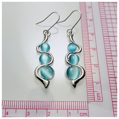 Aretes Ondulados Estilo Bohemio con Gema Ojo de Gato - Image 10