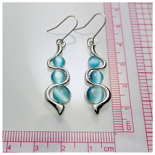 Aretes Ondulados Estilo Bohemio con Gema Ojo de Gato - Image 10