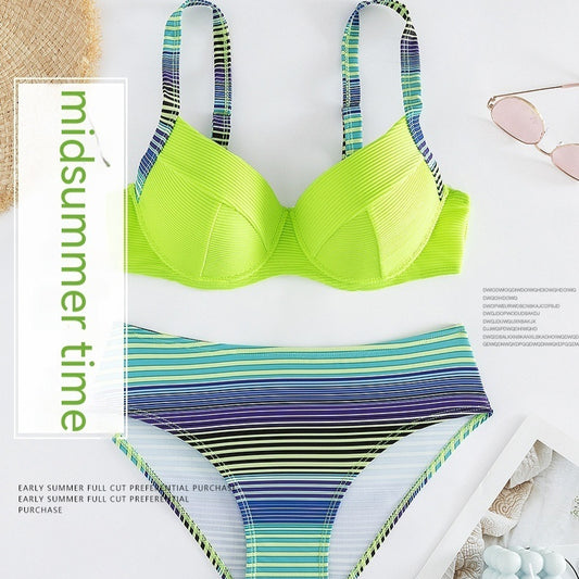 Neon green ribbed halter bikini top with striped straps and matching striped high-waisted bikini bottoms.