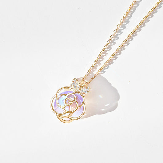 Gold-tone necklace with an iridescent camellia flower pendant and small clear stones on a delicate chain. - Image 7