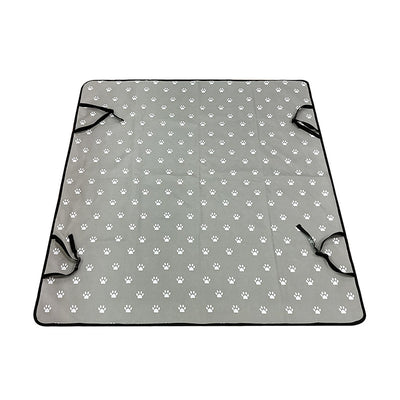 Pink car pet mat with white paw print and bone patterns, featuring black straps for securing to a rear seat. - Image 6