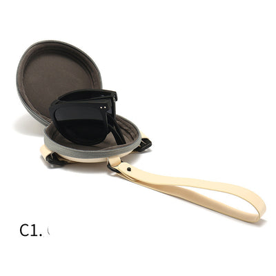 Light brown foldable women's sunglasses with round frames and brown polarized lenses on a white background. - Image 12