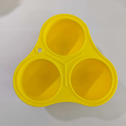 Bright yellow silicone pet toy ball with an open-cage design, ideal for slow feeding and teeth cleaning. - Image 6