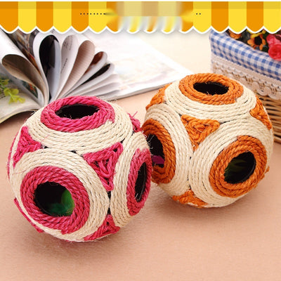 Two sisal cat toys, one pink and natural, one orange and natural, with multiple holes and feathers inside. - Image 7