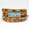 Pulsera de Cuero Multicapa Tejida a Mano con Hilo Dorado y Turquesa