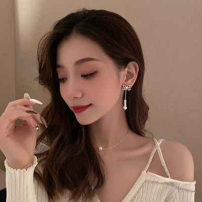 Aretes de Perla con Moño Elegante para Mujer - Image 2