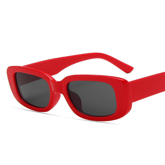 Black rectangular fashion sunglasses with dark lenses, featuring a thick frame and temples, angled on a white background. - Image 6
