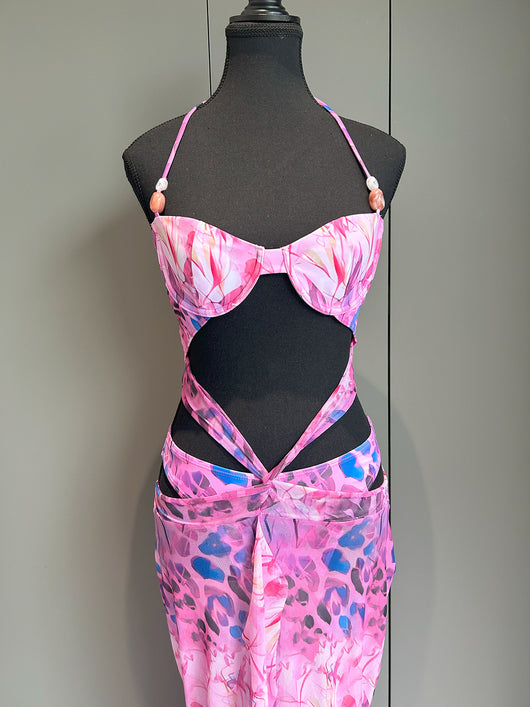 Women's two-piece swimsuit with a halter bikini top and a matching long skirt, featuring a vibrant tropical and animal print. - Image 7
