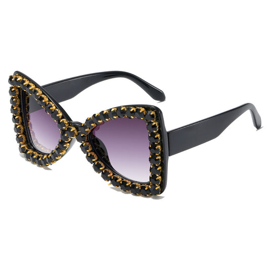Pink butterfly frame sunglasses with purple gradient lenses and sparkling purple rhinestone embellishments. - Image 3