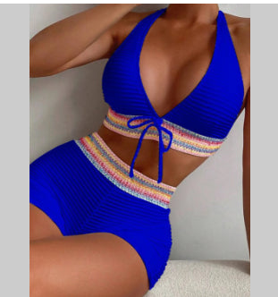 Navy blue ribbed two-piece bikini with a twisted front top and high-waisted ruched bottoms. - Image 16