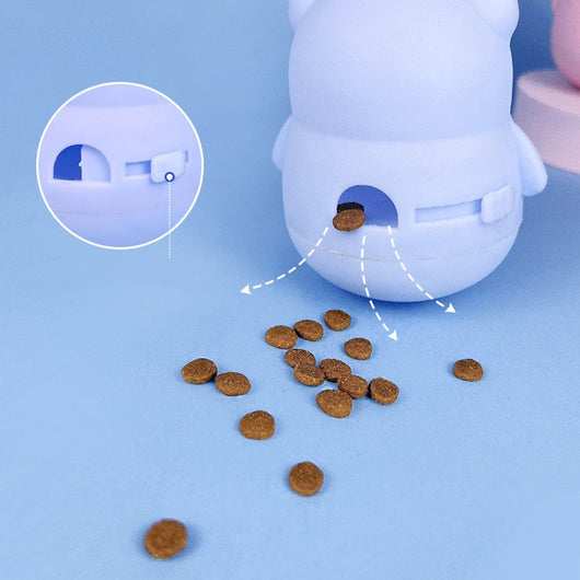 Light blue panda tumbler pet toy with a spring-attached feather and bell, designed to dispense treats. - Image 3