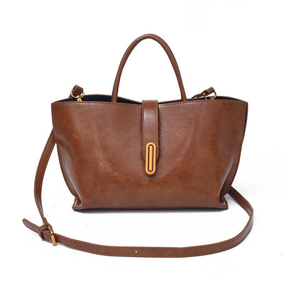Bolso Bucket de Cuero Encerado Elegante y Portátil - Image 5