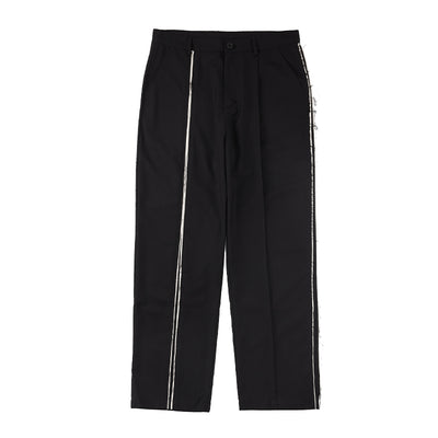 Pantalones Deconstruidos con Diseño Disruptivo - Image 9