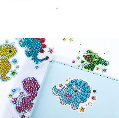 Cartoon diamond painting stickers featuring a narwhal, jellyfish, crab, fish, seahorse, and starfish with colorful resin gems. - Image 13