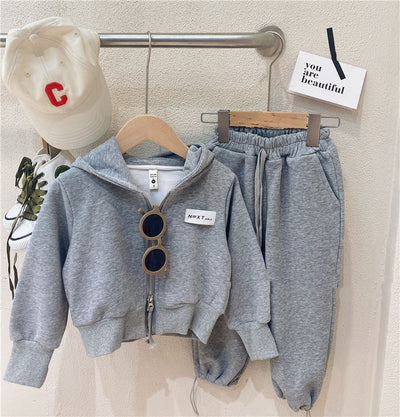 Pink hooded zip-up jacket and matching pants set for girls, featuring a small 'N=XT GIRLS' label. - Image 13