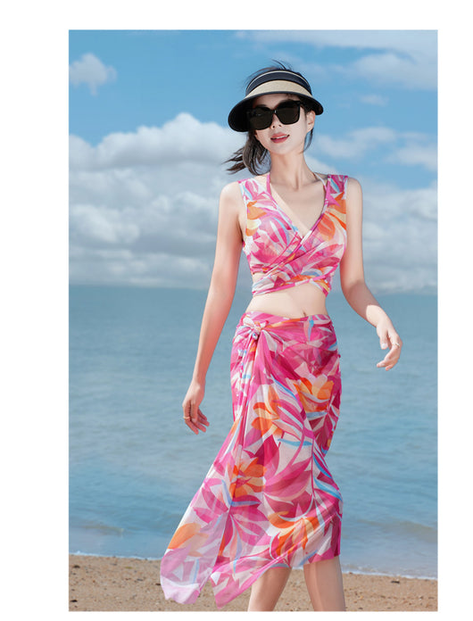 Women's light blue tropical leaf print three-piece swimsuit with short sleeve bikini top, bottoms, and sarong skirt. - Image 28