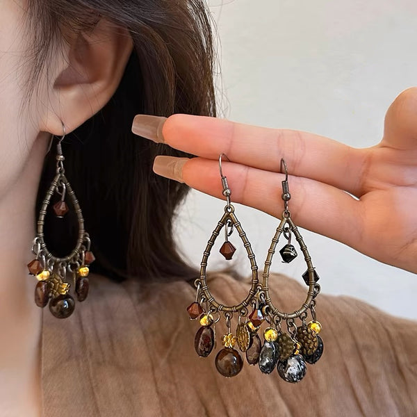 Aretes Retro Chinos de Gotas Huecas - Diseño Elegante