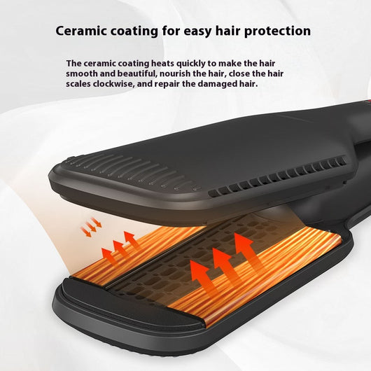 Black two-in-one hot air hair curler and straightener with a protective cap, temperature settings, and power button. - Image 3